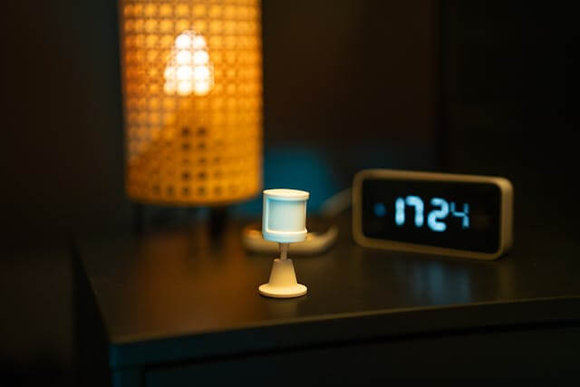 Smart motion sensor mounted on wall detecting movement, symbolizing home security, smart automation, and real-time alerts.