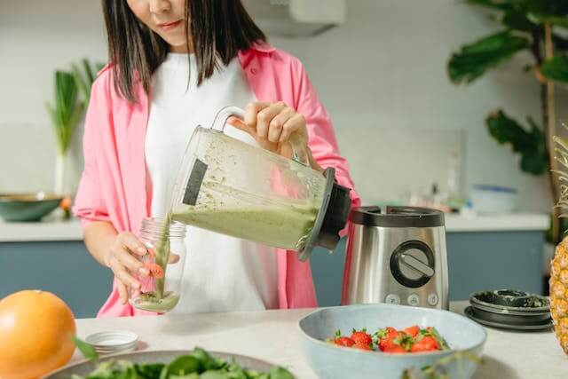 Smart kitchen gadgets on countertop including digital measuring tools, peelers, and slicers, symbolizing modern cooking efficiency